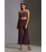 printed bustier paired with printed pants and jacket