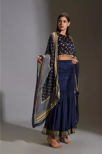 garara Paired With Incut Printed Crop Top Which Has Tassel Details. 