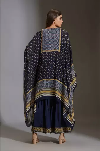 garara Paired With Incut Printed Crop Top Which Has Tassel Details. 