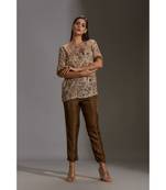 Prired One Shoulder Top Paired With Printed Pants