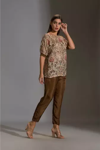 Prired One Shoulder Top Paired With Printed Pants
