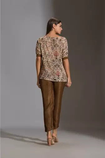 Prired One Shoulder Top Paired With Printed Pants