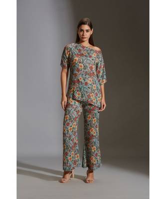 Prired One Shoulder Top Paired With Printed Pants 2