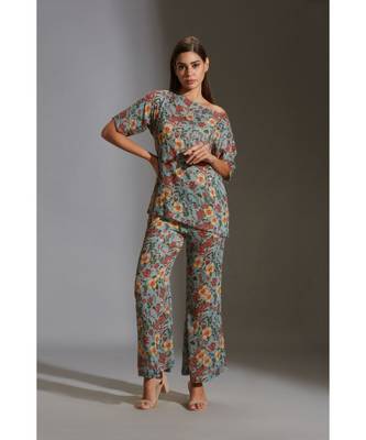 Prired One Shoulder Top Paired With Printed Pants 1