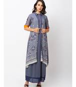 collar dress wuth gatheres at waist is paired with printed long jacket