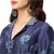 collar jacket with front opening and baloon sleeves is paired with dhoti pants