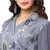printed overlap jacket with collar and gathers at waist  is paired with saree drape skirt
