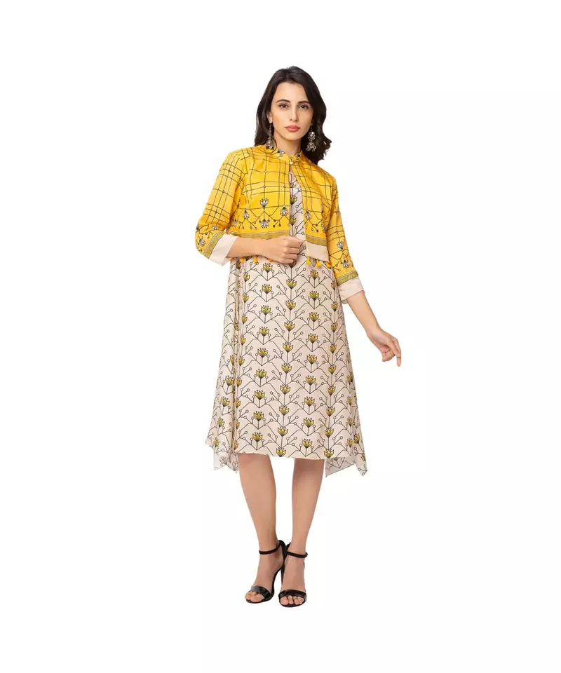 A line asymetrical dress paired with jacket