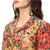 double layered printed jumpsuit  with belt detail is paired with printed collared short jacket