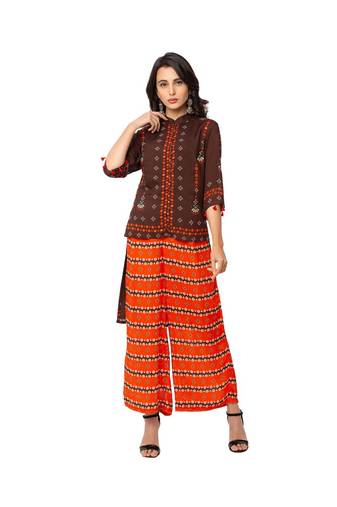 high low hem top with button detail is paired with flared pants