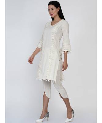 women set of off white cotton flex kurta with lace work on princess seam, tiered sleeves with co-ordinated petal pants 4