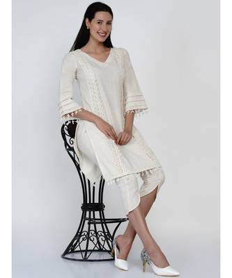 women set of off white cotton flex kurta with lace work on princess seam, tiered sleeves with co-ordinated petal pants 6