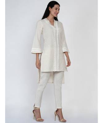 women off white cotton flex high low kurta with pleats and lace work at neck and sleeve hem 1