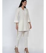 women off white cotton flex high low kurta with pleats and lace work at neck and sleeve hem