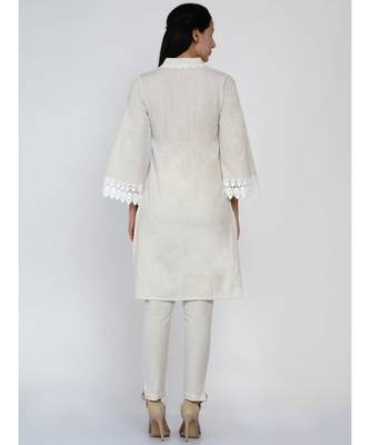 women off white cotton flex v neck kurta with lace work on neck and sleeve hem 3