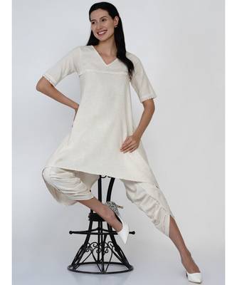 women off white cotton flex assymetric hem flared kurta with lace work 6