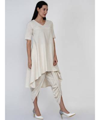 women set of off white cotton flex assymetric hem flared kurta with lace work and gathered dhoti pants 3