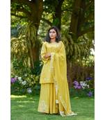 Yellow short kurta with Sharara and georgette dupatta