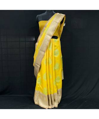Yellow Tanchui Buta Saree Creanm Blouse 1
