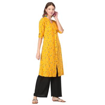 Yellow printed rayon kurtas-and-kurtis 4