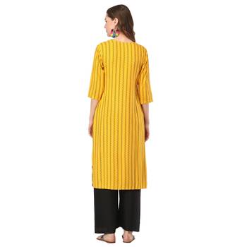 Yellow printed rayon kurtas-and-kurtis 2