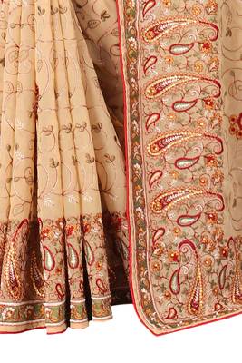 Beige embroidered georgette saree with blouse 3