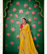 Yellow embroidered silk saree with blouse