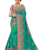 Turquoise embroidered silk saree with blouse