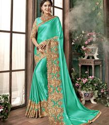  Shiny Lycra Silk Embroidery Turquoise Party Wear Saree With Blouse