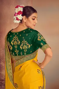 Yellow embroidered silk saree with blouse