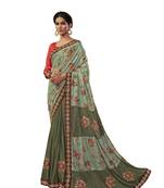 Light green embroidered jute saree with blouse