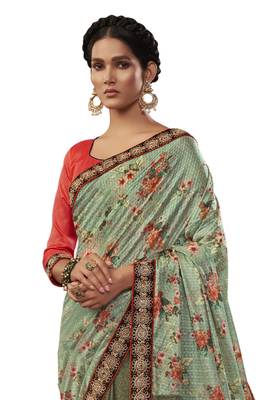 Light green embroidered jute saree with blouse 2