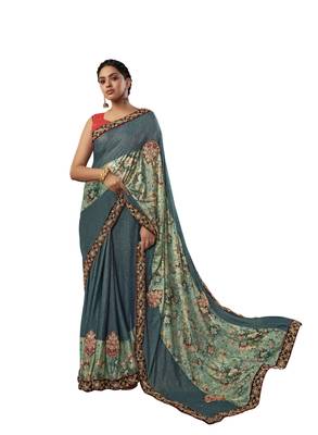 Turquoise embroidered jute saree with blouse 1