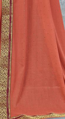 Orange embroidered lycra saree with blouse 3