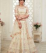 Off-white embroidered net semi stitched lehenga