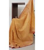Mustard orange silk cotton benaras brocade with antique zari temple border saree