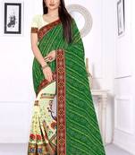 green embroidered georgette saree with blouse