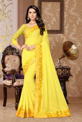 yellow embroidered georgette saree with blouse 1