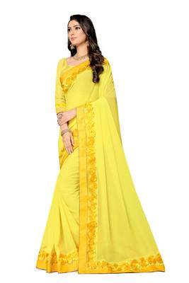 yellow embroidered georgette saree with blouse 2