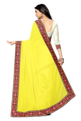yellow embroidered georgette saree with blouse 4