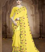 yellow embroidered georgette saree with blouse