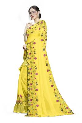 yellow embroidered georgette saree with blouse 2