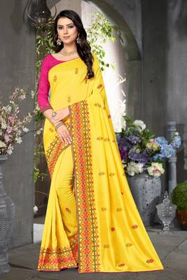 yellow embroidered georgette saree with blouse 1