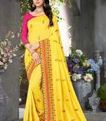 yellow embroidered georgette saree with blouse