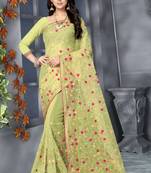 Light green embroidered net saree with blouse