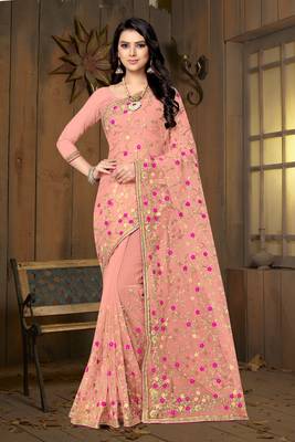 Peach embroidered net saree with blouse 1