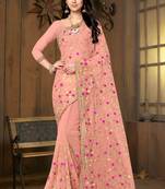 Peach embroidered net saree with blouse