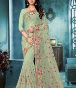Green embroidered net saree with blouse