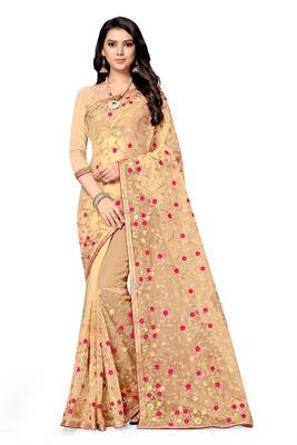 Golden embroidered net saree with blouse 2