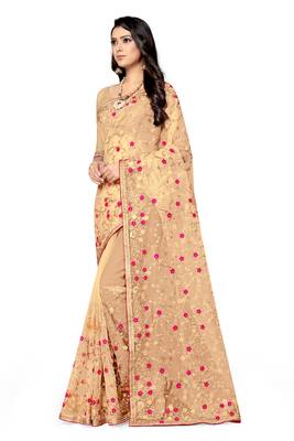 Golden embroidered net saree with blouse 3